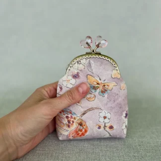 Рожевий гаманець з акварельними квітами