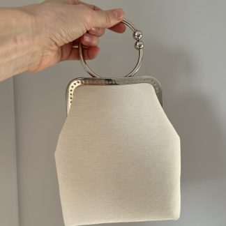 Елегантна молочна сумочка